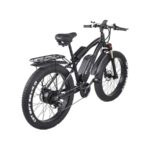 Shengmilo MX02S sähkömaastopyörä leveillä renkailla metsäpolulla